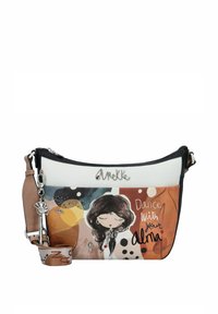 Umhängetasche aus schwarz-weißer Kunstleder, mit einem illustrierten Design aus bunten Kreisen und dem Spruch "Tanze mit deiner Alma."