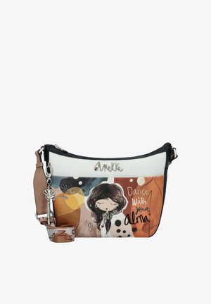 Sac à bandoulière en faux cuir noir et blanc, présentant un design illustré avec des cercles colorés et l'inscription "Danse avec ton Alma."