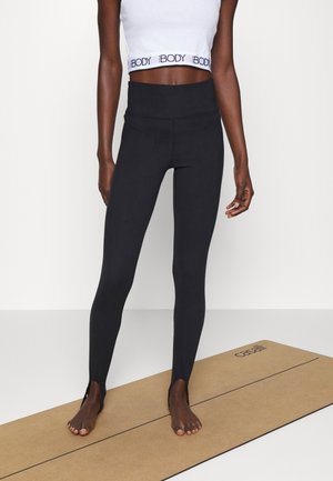 ULTRA SOFT MOVEMENT STIRRUP - Leggings - black