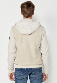 Koroshi Jachetă din fleece - beige