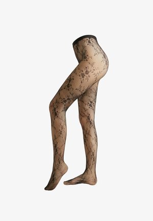 Černé průhledné punčocháče s květinovým vzorem z rybí sítě, zobrazené na nohou s jednou zvednutou nohou, což ukazuje detailní vzor a pás.