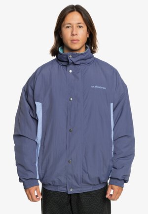 Purple insulated jacket with light blue accents, high collar, snap buttons, and elastic cuffs. Features a soft texture and loose fit.