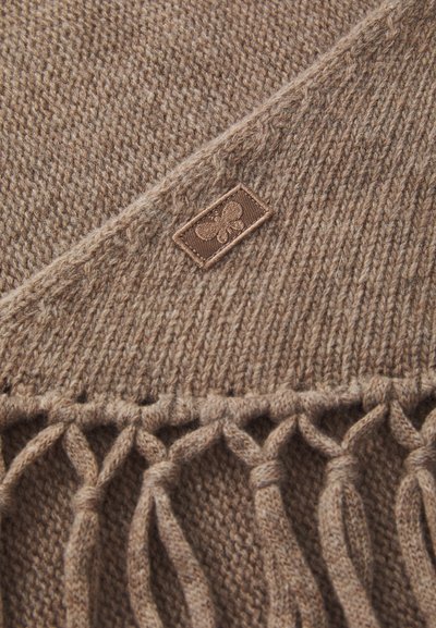 Brown knitted scarf made from soft material, featuring a woven texture, fringe detailing at the edge, and a small branded tag.