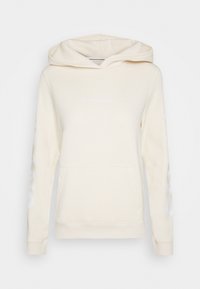 Felpa con cappuccio color avorio, dotata di tasca a marsupio frontale, polsini a coste e logo "Calvin Klein Jeans" sul petto e sulle maniche.