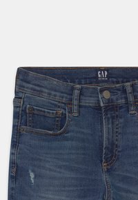 GAP BOYS - Vaqueros pitillo - blue denim
