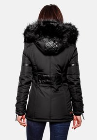 Black padded jacket with a faux fur hood, quilted detailing on the hood, and leather-like accents on sleeves and waist.