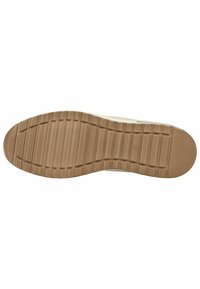Semelle de chaussure en caoutchouc brun clair avec des rainures horizontales et des motifs texturés pour l'adhérence et la traction, vue du dessous.