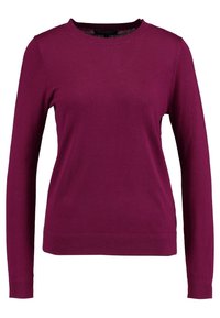 Långärmad tröja med rund halsringning i en rik magenta färg, tillverkad av mjukt, slätt tyg med ribbade muddar och nederkant.