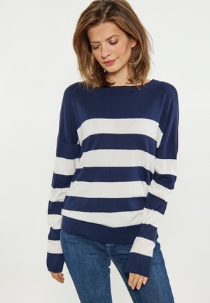 Maglione a righe navy e bianche con scollo a barca e maniche lunghe, realizzato in tessuto morbido. Distingue per le sue ampie righe e la vestibilità rilassata.