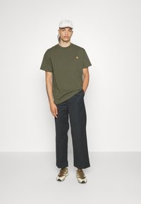 Carhartt WIP BROOKER PANT  - Pantaloni - black rigid