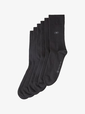 Schwarze Crew-Socken aus einem weichen Stoff, mit gerippten Bündchen und einem dezenten Logo-Druck. Sechserpack mit glatter Textur.