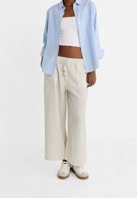 Stradivarius Tygbyxor - mottled beige