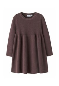 Strikket kjole i mørk mauve, med rund halsudskæring, lange ærmer og flagrende kant. Ribbet tekstur med tætsiddende liv og volantskørt.