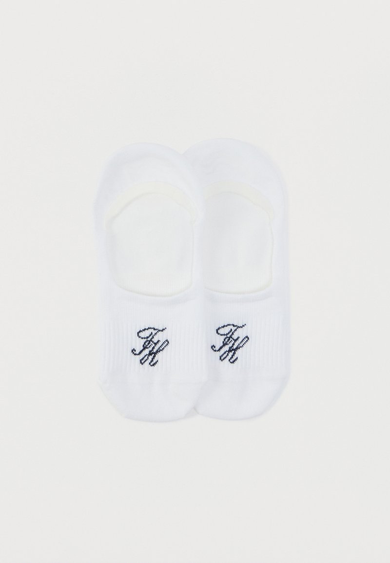 Άσπρες βαμβακερές κάλτσες αστραγάλου με ριμπ μανσέτες και κεντημένα ναυτικά μονογράμματα στο πλάι. Λείο ύφασμα και σχεδιασμός χαμηλής κοπής για διακριτική χρήση.