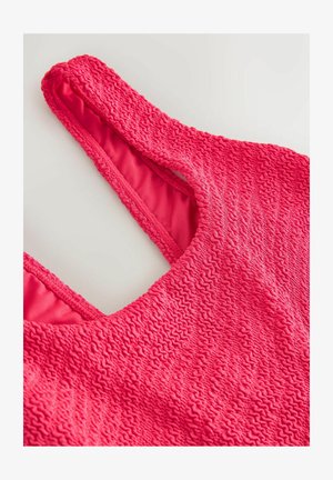 Roze badpak met textuur in tanktopstijl, met een gerimpelde buitenkant en een gladde binnenvoering. Verstelbare bandjes voor een goede pasvorm.