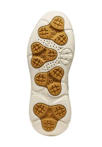 Semelle d'une chaussure avec une base en caoutchouc beige dotée d'une surface texturée, des accents marron et des trous de ventilation pour la respirabilité.