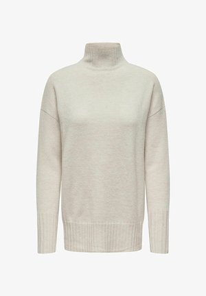 Vaaleanbeige poolopaita, joka on valmistettu pehmeästä, tekstuurisesta kankaasta. Siinä on rento mitoitus, ribbaatut hihansuut ja helma sekä minimaalinen yksityiskohtaisuus.