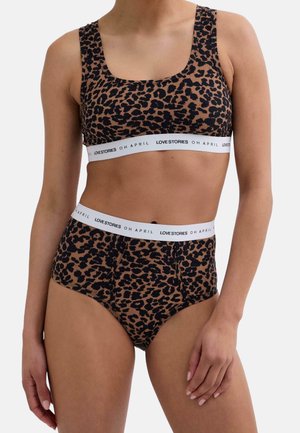 RIKA  - Biustjė - leo