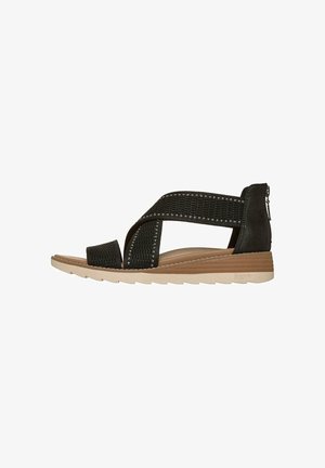 Zwarte sandalen met open teen en gekruiste stoffen bandjes, gevoerde tan zool, lage sleehak en rits aan de achterkant voor sluiting.