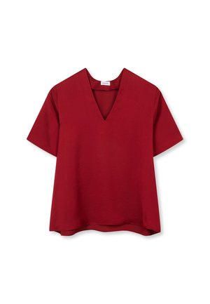 Blusa rossa a maniche corte con scollo a V e vestibilità leggermente ampia, mostrata su sfondo bianco.