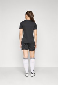 adidas Performance TIRO24 TRAINING SHORTS WOMEN - Sports shorts - black/purple rush