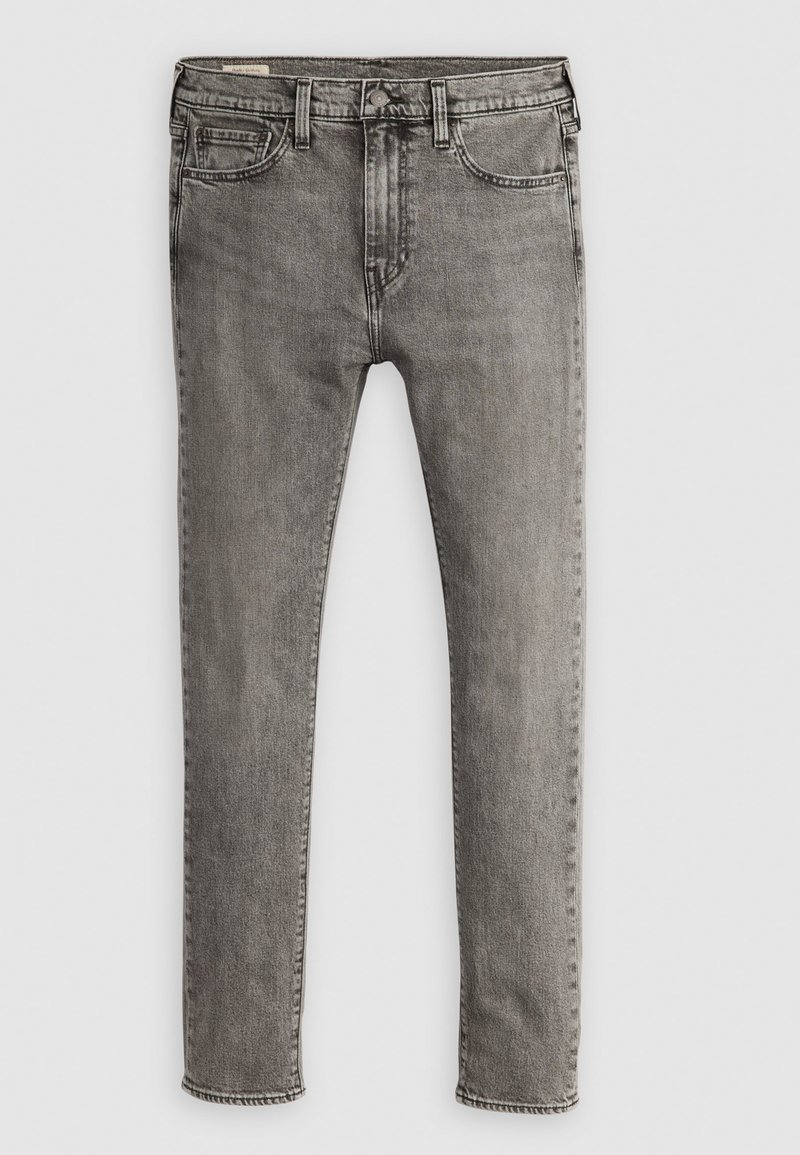 Jeans en denim gris avec un design ajusté, style à cinq poches et des détails cousus le long des coutures. Texture lisse, taille standard.