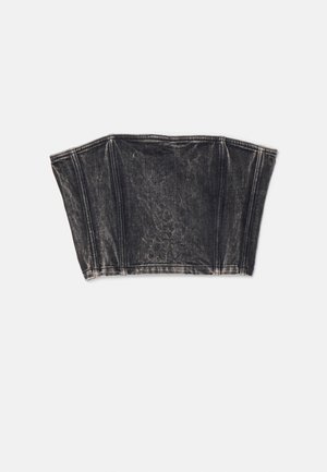 Bustier en denim noir au design structuré, avec des coutures verticales et une forme ajustée et courte. Surface texturée avec un léger dégradé.