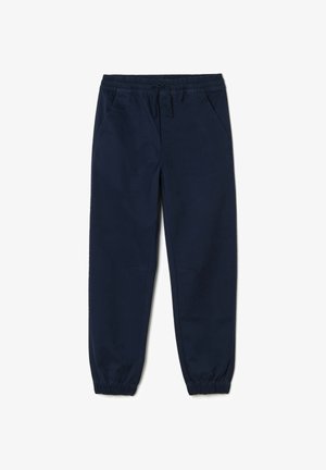 Pantalones jogger azul marino hechos de material suave, con una cintura elástica y cordón, bolsillos laterales y puños elásticos en los tobillos.