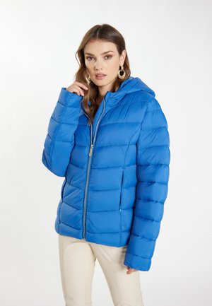 Blauwe pufferjack met een capuchon, voorzien van een gequilte ontwerp, een rits aan de voorkant en zijzakken. Gladde, glanzende stof en een ontspannen pasvorm.