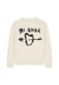Felpa color crema con un design grafico nero sul retro, con il testo "Mi Amor" e un cuore con una freccia.