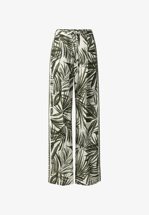 Spodnie o szerokich nogawkach z zielonym, tropikalnym wzorem liści palmowych na białej tkaninie oraz ściągaczem w pasie.