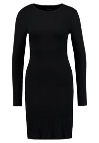 Svart ribbad långärmad klänning med rund halsringning och figursydd silhuett, tillverkad av ett stretchtåligt tyg för komfort och flexibilitet.