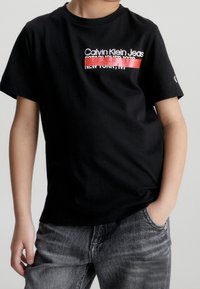 Calvin Klein Jeans Camiseta estampada - black