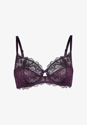 Reggiseno viola in pizzo con intricate fantasie floreali, struttura con ferretto, coppe trasparenti, bordi scallopati decorativi e un dettaglio a chiave al centro.