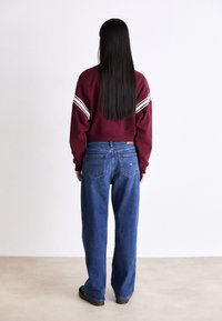 Tommy Jeans Traperice opuštenog kroja - denim dark