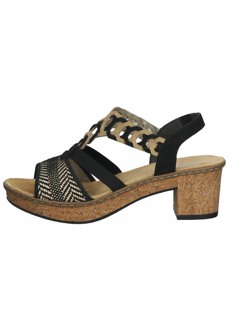 Sandale noire et beige à bout ouvert avec bride avant tissée, bride de cheville décorative ajourée, talon bloc en liège et bride arrière de maintien.