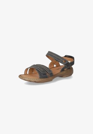 Schwarze Leder-Sandalen mit zwei gekreuzten verstellbaren Riemen, offenem Zehenbereich und gepolstertem Innensole. Detaillierte Nähte und gerundete Sohle.