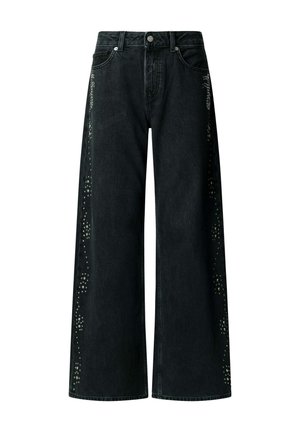 Zwarte wijde denim jeans met metalen knoop en klinknagels, met decoratieve zilveren studpatronen langs de buitennaad van beide pijpen.