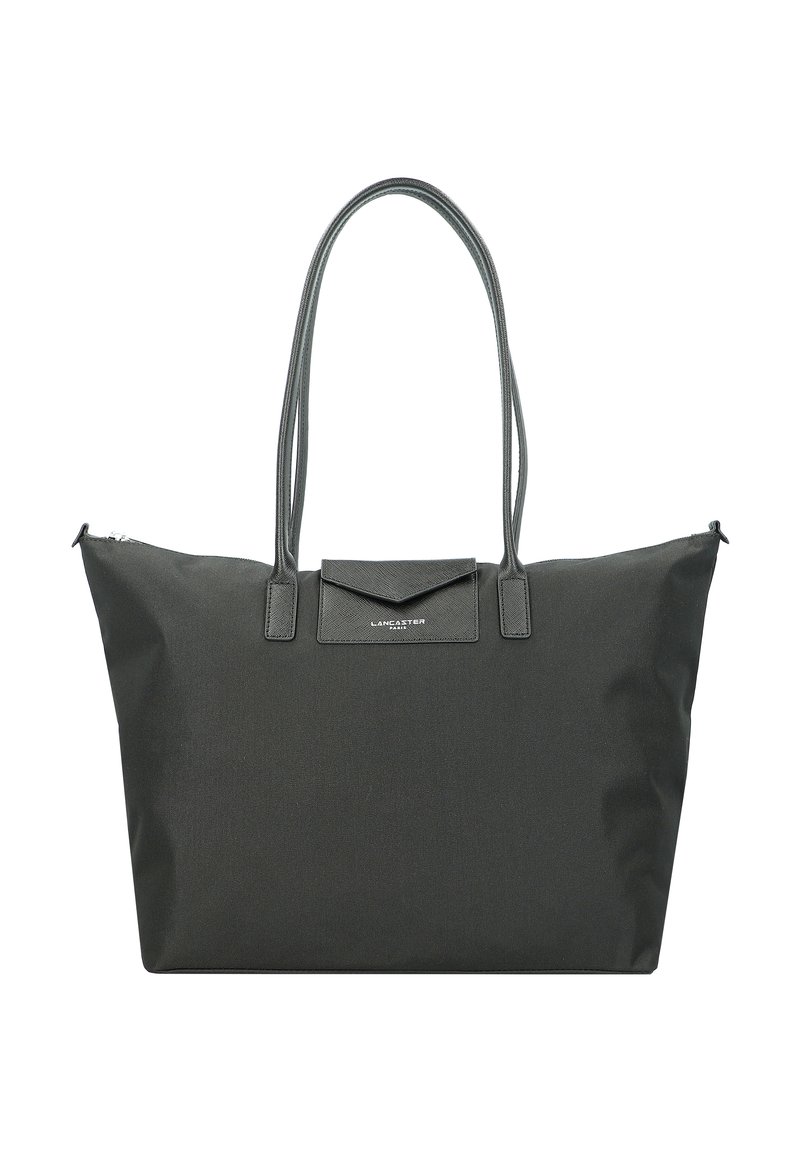 Black fabric tote bag with two long handles, zip closure, and a front flap. Features a smooth texture and a small brand logo detail.