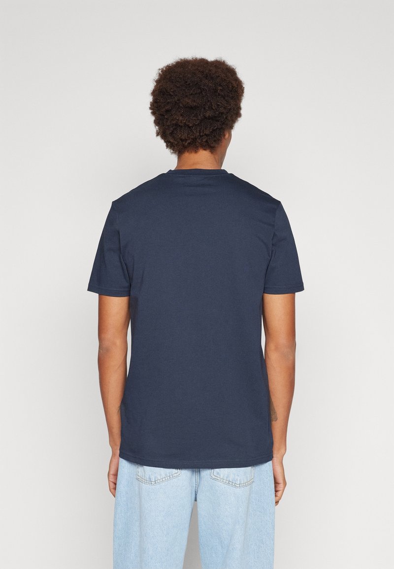 Mörkblå bomullströja med korta ärmar, rund halsringning och avslappnad passform. Enkelt design utan synliga logotyper eller mönster.