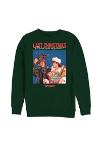 Felpa verde con grafica natalizia con due figure circondate dalla neve. Il testo dice "Lo scorso Natale, ti ho dato il mio cuore."