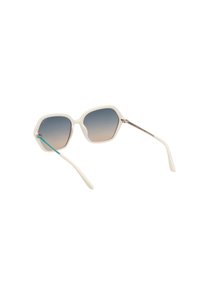 Witte hexagonale zonnebril met een verloop van blauwe lenzen, voorzien van een slanke metalen arm met een turquoise accent en gladde plastic pootjes.