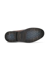 Suela de zapato de cuero marrón con goma negra texturizada, con un patrón de banda de rodadura geométrico y el nombre de la marca "McGregor" grabado en el centro.