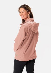 Light pink waterproof jacket with a hood, featuring a mesh lining and adjustable drawstring. Smooth texture and relaxed fit.