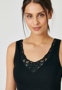 Damart ESSENTIAL APPLICATION FLORALE - Maglietta intima - noir