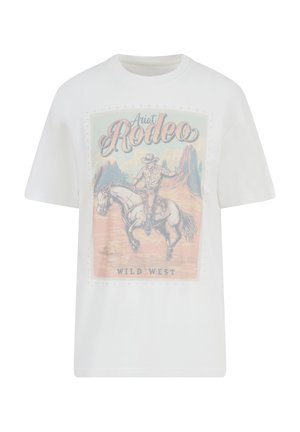 White cotton t-shirt featuring a retro rodeo graphic with a cowboy on a horse, surrounded by a desert landscape and decorative studs.