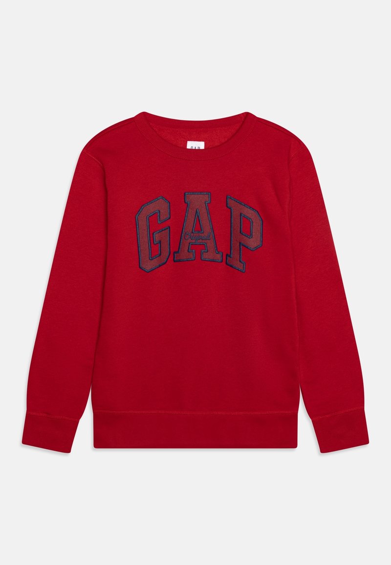 Sweat-shirt rouge à manches longues avec le texte "GAP" en contours bleu marine et "Original" brodé au centre sur un fond uni.