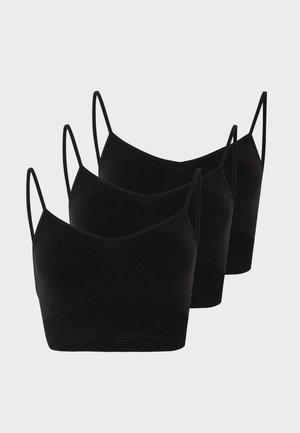 Τρία μαύρα αμάνικα crop tops χωρίς ραφές με λεπτές τιράντες, τοποθετημένα σε ελαφρώς ανισόπεδη σειρά πάνω σε ένα απλό ανοιχτό φόντο.