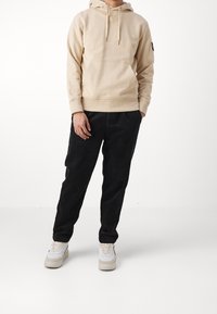 Calvin Klein Jeans Jersey con capucha - beige
