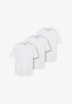 Drie eenvoudige witte t-shirts met korte mouwen, ronde halsen en een reguliere pasvorm. De stof lijkt glad en lichtgewicht, zonder zichtbare patronen.
